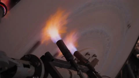 Factory grinder rotates and fired with gas burner, industrial process Video stock 138371347