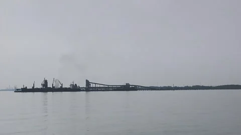 Factory harbor pier in the middle of the sea Stock Footage 307744930