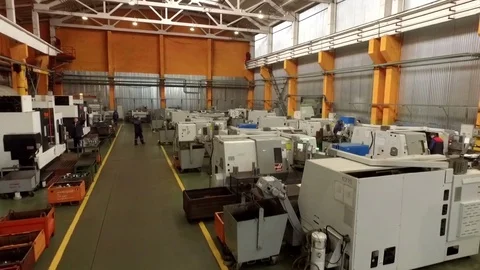 Factory with high tech equipment and computer-integrated manufacturing machines Stock Footage 71024020