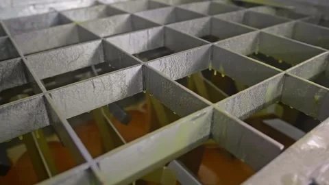Factory homogenizer with honey being mixed inside Stock Footage 248363473