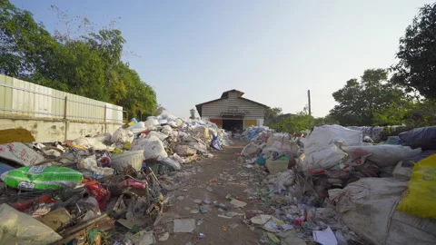 Factory industry with stack of different types of large garbage dump, plastic Video stock 168276442