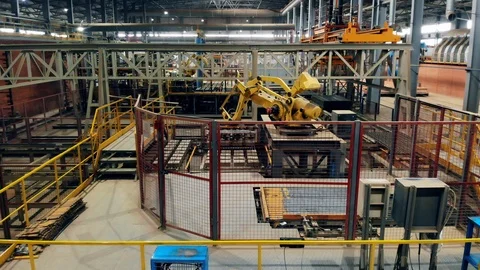 Factory interior, industrial machine working with a conveyor. Stock Footage 114994947