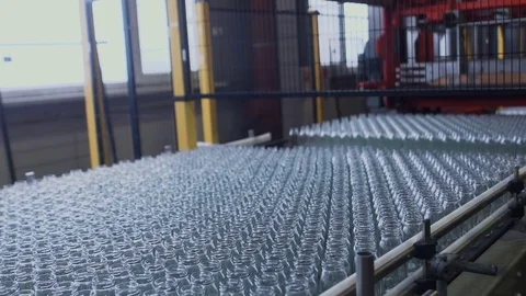 Factory. Juice production. Conveyor of bottle Stock Footage