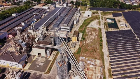 Factory with large equipment and solar panels in daytime Stock Footage 342603395