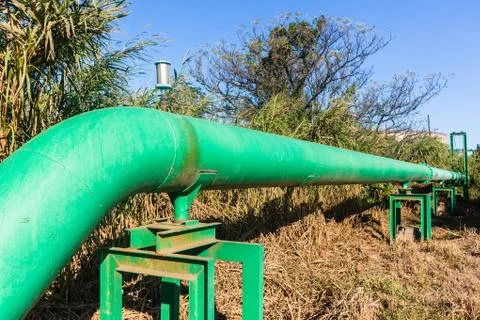 Factory Long Green Water Pipe Stock Photos