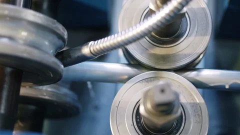 At factory, the machine makes pipes, all in water, a non-stop working process Stock Footage 115935445