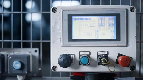 Factory machine screen controlling production process showing data closeup Stock Photos