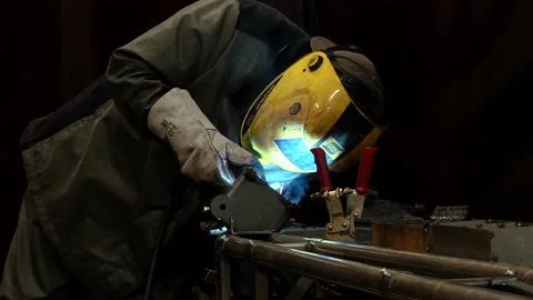 Factory Man Welding the Metal Structure Welder in Protective Mask Sparks Stock-Footage 160368271