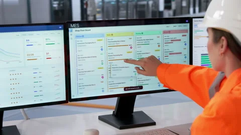 Factory Manager Carefully Monitors Production Scheduling Stock Footage 333843823