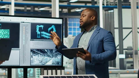 Factory managers doing pitch in front of investors, showing production plans Stock Footage 306109717