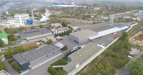Factory with modern design top view. Modern factory aerial view. Flight over the Видео 151019970