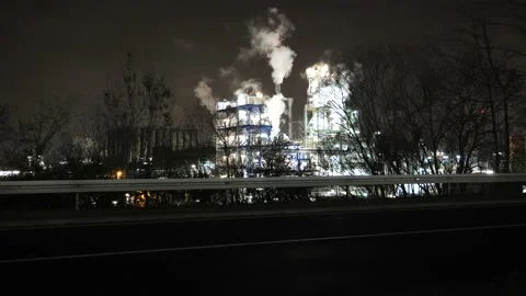 Factory at night - bright light, smoke Stock Footage 152847975