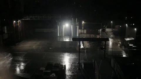 Factory in night light raining technology construction city industrial industry Stock Footage 96124187