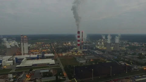 Factory at night, lighted chimneys, aerial view Stock Footage 86860586