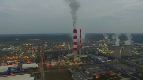 Factory at night, lighted chimneys, aerial view Stock Footage 86860696