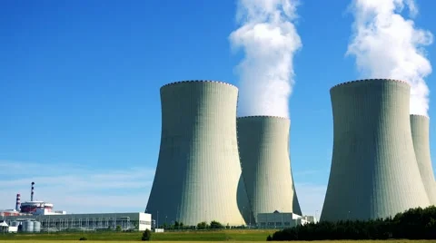 Factory (nuclear power station) - closeup of buildings and smoke from chimney 動画素材 67836160