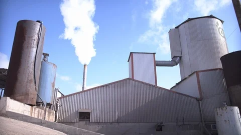 Factory in operation. Smoke comes out of the chimney Stock Footage 121695897