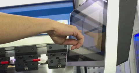 Factory operator using touchscreen industrial machine interface Stock Footage 327130764