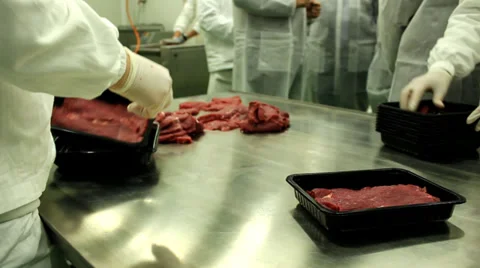 Factory packing raw meat Stock Footage