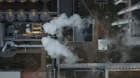 Factory pipes pollute the atmosphere. Pollution of industrial enterprises Stock Footage 225664164