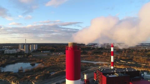 Factory pipes smoke at sunset Stock Footage 73918674