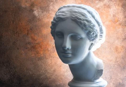 Factory plaster bust of Aphrodite on a rusty antique background with a very b 写真素材