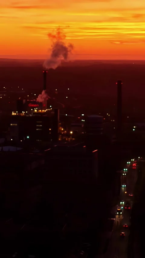 Factory pollution skyline with car traffic at dusk Stock Footage 337644529