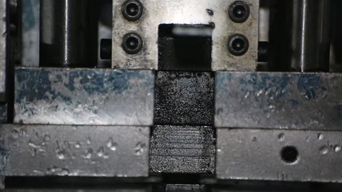 At the factory, the press bends the steel bars and cuts small pieces . Press up Video stock 95008056