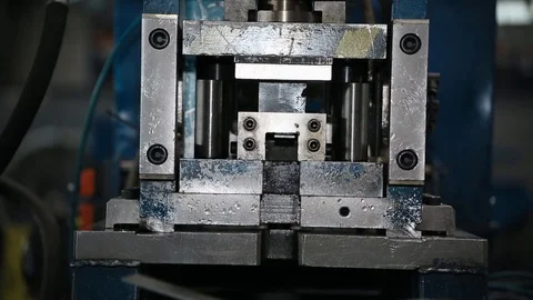At the factory, the press bends the steel bars and cuts small pieces . Press up Stock Footage 95008133