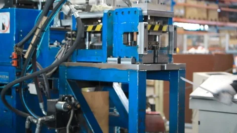At the factory, the press bends the steel bars and cuts small pieces . Press up Stock Footage 95008152