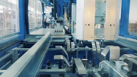 Factory press is manufacturing carton boxes Stock Footage 128389054