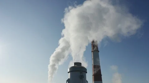 Factory producing smoke. Air pollution, industry impact on environment Stock Footage 113324215
