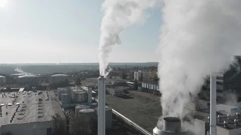 Factory producing smoke. Air pollution, industry impact on environment Stock Footage 113324366