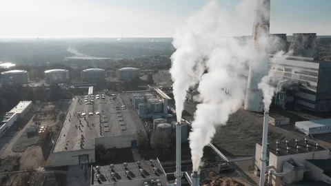 Factory producing smoke. Air pollution, industry impact on environment Stock Footage 113324442