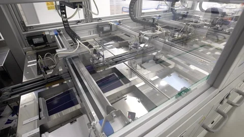 Factory producing solar cells panels discharged from mechanic column Stock Footage 118006929