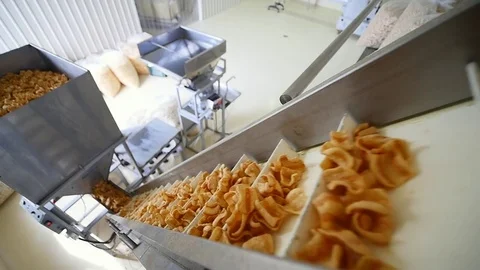 Factory production of corn snacks Stock Footage 81814573