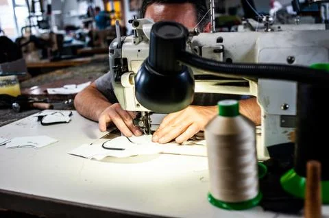 Factory for the production of high quality leather shoes Stock Photos