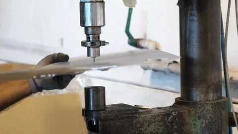 Factory production line, laborer working on punching machine. Stock Footage 93126002