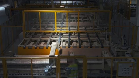 Factory production line. A worker works in a factory. Drywall production. Stock Footage 123060269