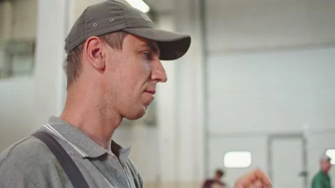 Factory Production Worker in Cap Stock Footage 197114594