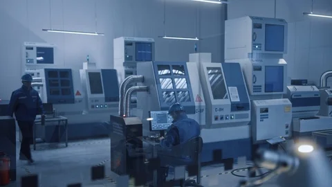 In Factory: Professionals Working on CNC Machinery Walk Through Workshop Stock Footage 126153294