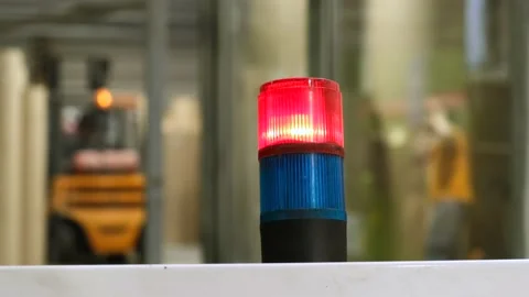 Factory red warning lamp close-up. A loader with a yellow warning light Stock-Footage 144577612