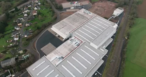 Factory Rooftops With Skylights Along Railway, Near Vertical Aerial View Vídeo Stock 340648707