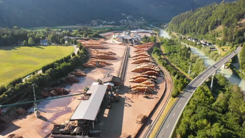 Factory sawmill forest mountains road aerial Stock Footage 126325678