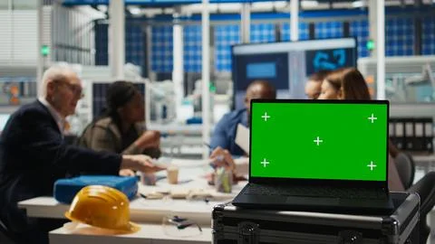 Factory scientists doing research and development using mockup laptop Stock Photos