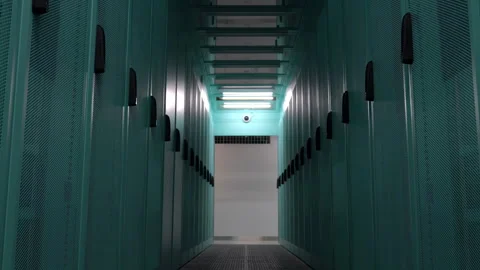 Factory setting Industrial Data Center with Rows of Yellow Server Cabinets Stock Footage 309530348