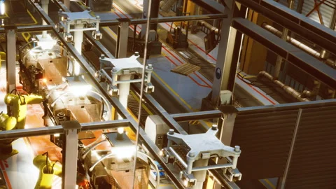 Factory setting with robotic arms working on assembly line tasks Stock Footage 342810249