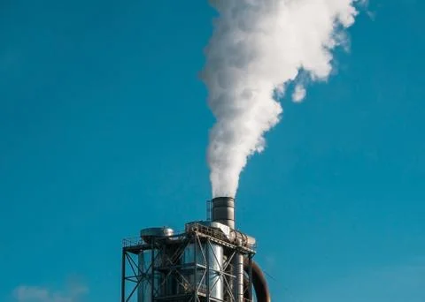 Factory smog ejecting pipes into the environment Stock Photos