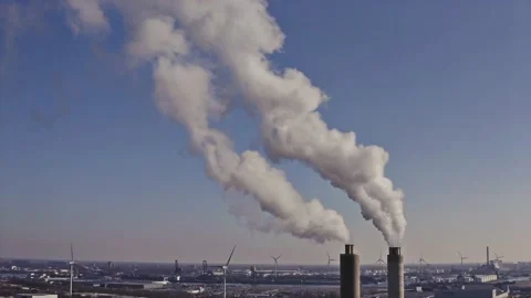 Factory with smoke into the blue sky Stock Footage 231487670