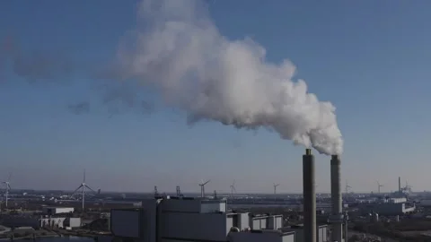 Factory with smoke into the blue sky Stock Footage 231487773